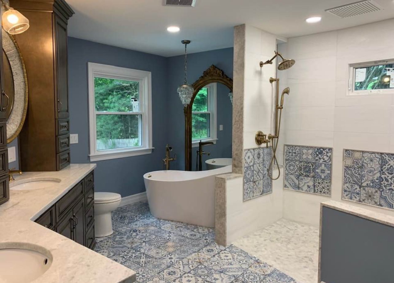 Completed luxury master bathroom remodel in Newington CT demonstrating excellent lighting and ventilation